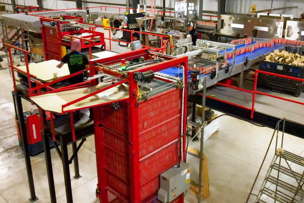 a palletizer packaging machine in a warehouse