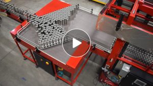 Depalletizer with bi-directional mass accumulation table